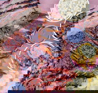 Bovine and Swine Barbeque - Stayed