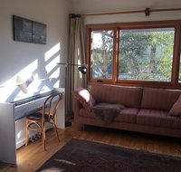 Eco-renovated light-filled house on a hill