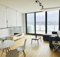 Modern Designer 2BR Apartment Near Airport  Beach